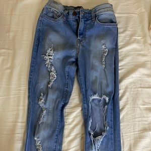 Light blue ripped jeans , size 1